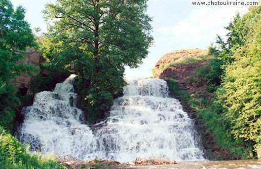 Village Nyrkiv. Artificial waterfall on Dzhuryn river Ternopil Region Ukraine photos