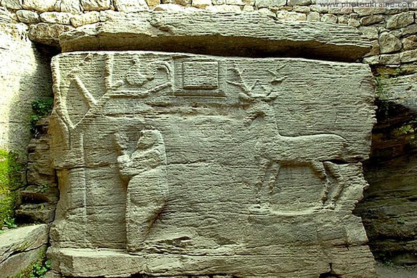 Busha. Bas-reliefs, simulating of cave temple Vinnytsia Region Ukraine photos
