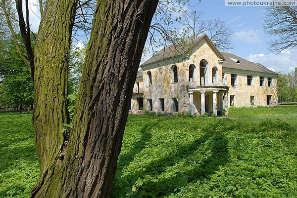 Holoby. Vilgov manor house and old tree Volyn Region Ukraine photos