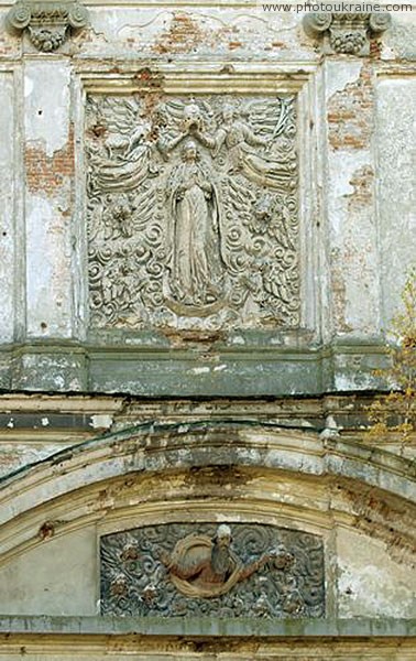 Olyka. Detail of front facade decor Trinity church Volyn Region Ukraine photos