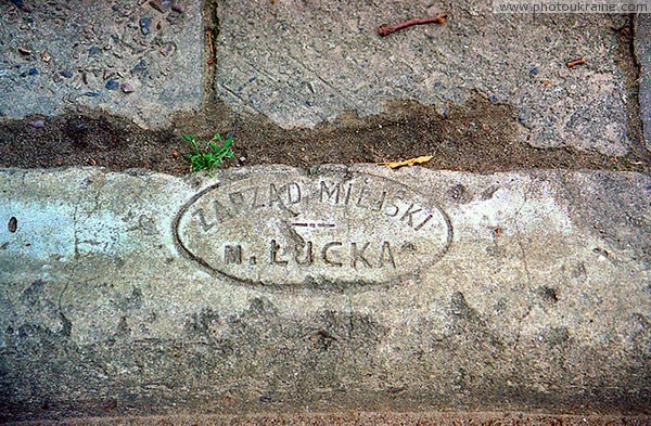 Lutsk. Inscription on pavement in Peter and Paul church Volyn Region Ukraine photos