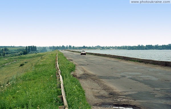 Leninske. Dam, saving Kamenka river floodplain from flooding Kakhovka sea Dnipropetrovsk Region Ukraine photos
