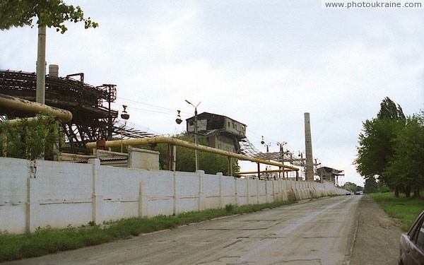Amvrosiivka. Long fence of cement plant Donetsk Region Ukraine photos