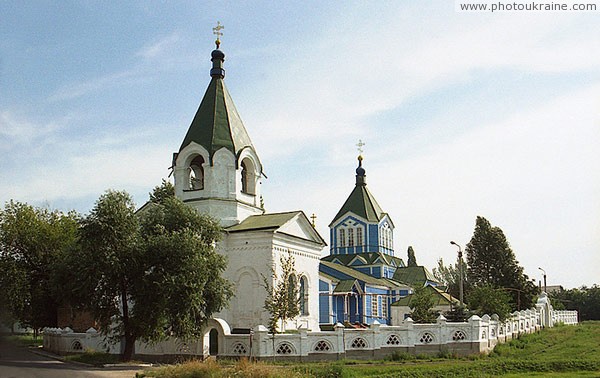 Artemivsk. Former stone bell tower (now  St. John Predtechinsky temple) and wooden Nicholas Church Donetsk Region Ukraine photos