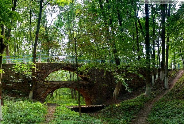 Verkhivnia. Two-storey arched bridge park Zhytomyr Region Ukraine photos
