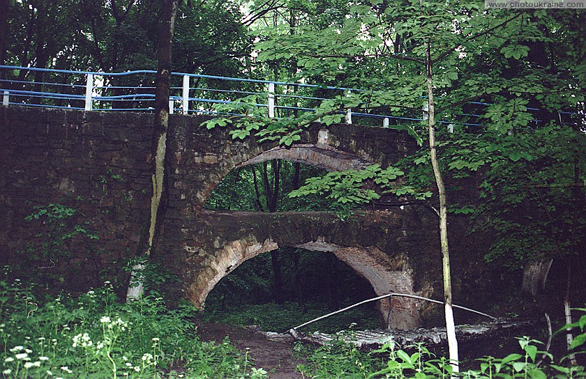 Verkhivnia. Arched Bridge Park Zhytomyr Region Ukraine photos