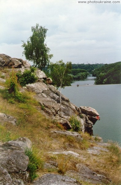 Zhytomyr. Rock Head Chatskyi over water surface Zhytomyr Region Ukraine photos