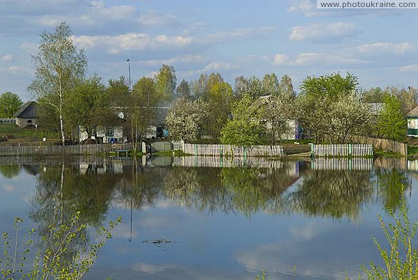 Ubort river begins just outside fence Zhytomyr Region Ukraine photos
