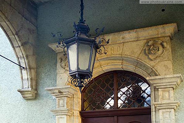Karpaty. Lantern over main entrance of palace Zakarpattia Region Ukraine photos
