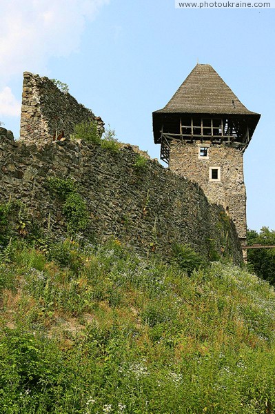 Nevytske. South tower and castle wall Nevytske Zakarpattia Region Ukraine photos