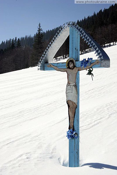 Reserve Synevyr. Crucifix on side of Gorgany Zakarpattia Region Ukraine photos