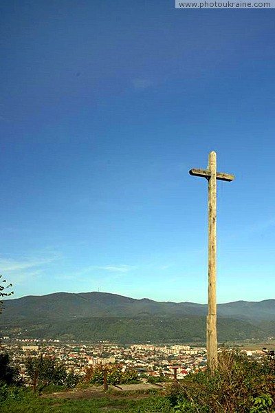 Hust. Cross on Castle Hill Zakarpattia Region Ukraine photos