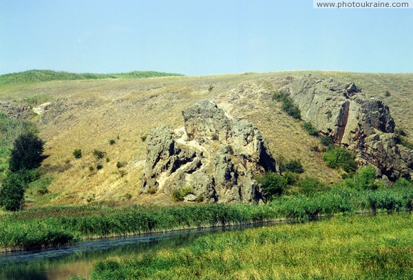 Radyvonivka. Granite Reed framing Berda Zaporizhzhia Region Ukraine photos