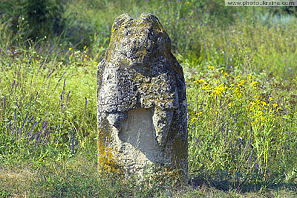 Terpinnia. Torn time stone idol Zaporizhzhia Region Ukraine photos