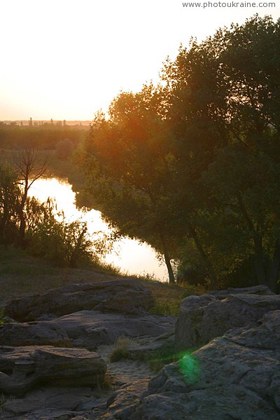 Terpinnia. Molochna river in rising sun Zaporizhzhia Region Ukraine photos