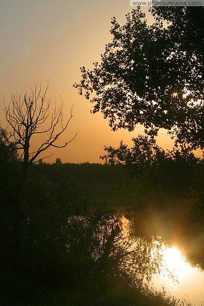 Terpinnia. Glimmer of dawn over river Molochna Zaporizhzhia Region Ukraine photos
