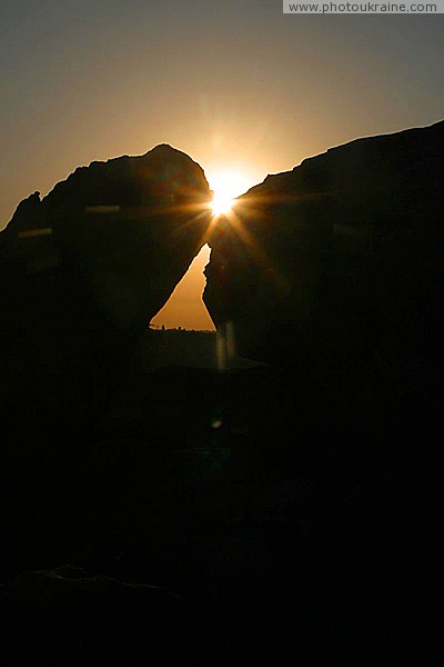 Terpinnia. Morning stone silhouette Zaporizhzhia Region Ukraine photos