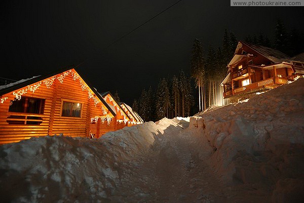 Bukovel. Snow trench cottage town Ivano-Frankivsk Region Ukraine photos