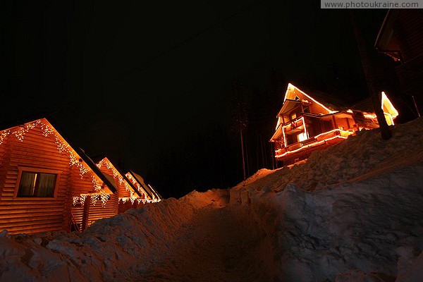 Bukovel. Cottage town late at night Ivano-Frankivsk Region Ukraine photos