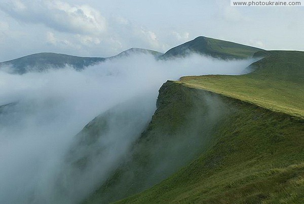 Pre-Carpathians. Valley fog crosses mountains Ivano-Frankivsk Region Ukraine photos