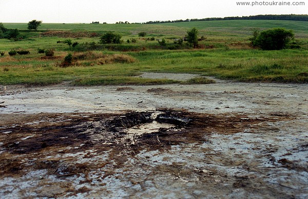 Starunia. Crater that produces oil and clay pulp Ivano-Frankivsk Region Ukraine photos
