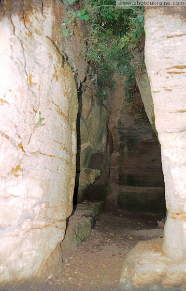 Busha. In womb of Cave temple Vinnytsia Region Ukraine photos