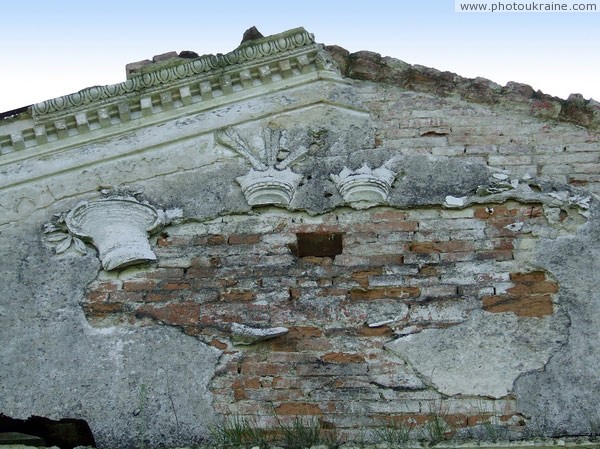 Andrushivka. Remains of stucco coat of arms on pediment of palace Vinnytsia Region Ukraine photos