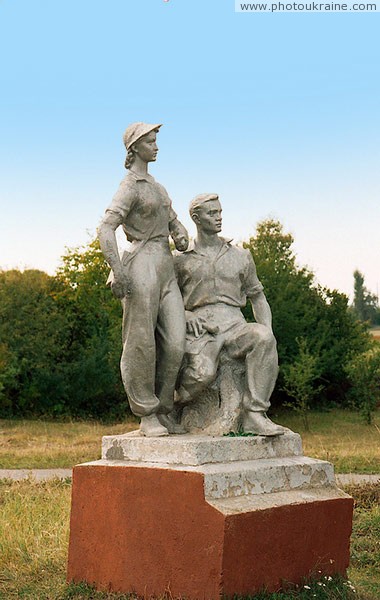 Zhovtneve. Soviet monument at entrance to small town Volyn Region Ukraine photos