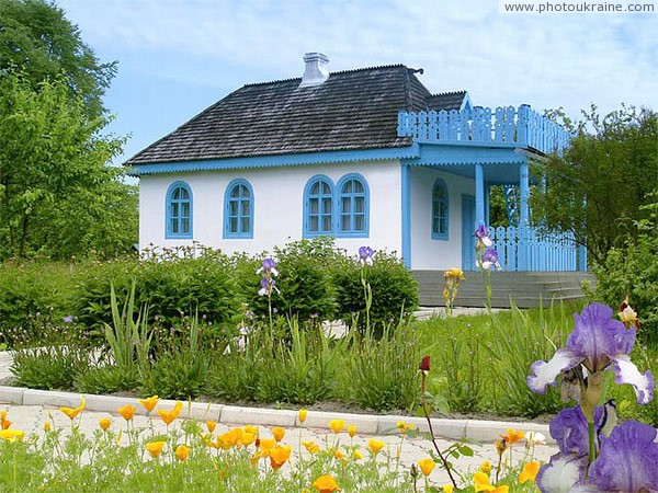 Kolodyazhne. White house farmstead of Kosach Volyn Region Ukraine photos