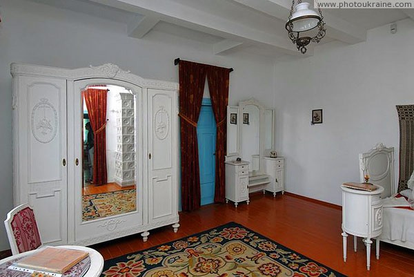 Kolodyazhne. Bedroom of manor Gray house Volyn Region Ukraine photos