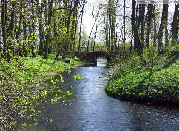 Lukiv. Stone bridge across water-filled old defensive moat Volyn Region Ukraine photos