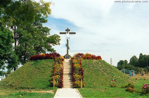Nyzkynychi. Man-hill near walls of monastery Volyn Region Ukraine photos
