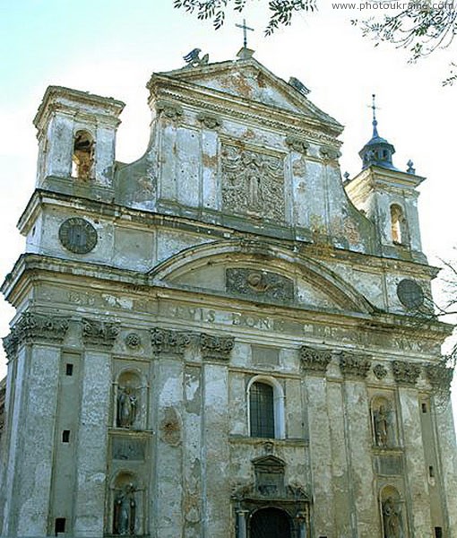 Olyka. Once-elegant facade of ceremonial Trinity church Volyn Region Ukraine photos