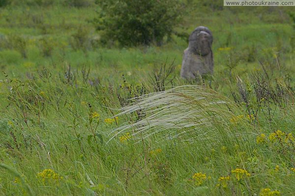 Kamiani Mohyly Reserve. Feather and woman Donetsk Region Ukraine photos