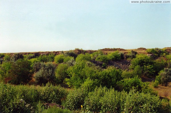 Novokaterynivka. Neglected and overgrown quarry Donetsk Region Ukraine photos