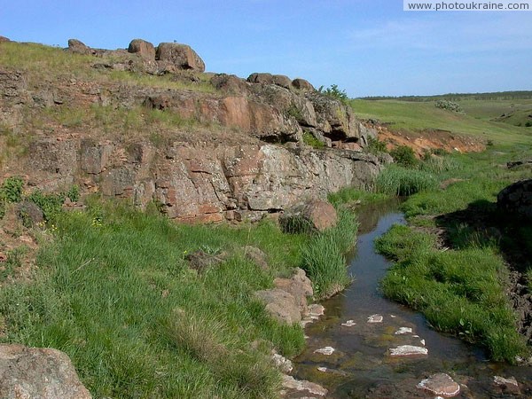 Telmanove. Granite convoy steppe stream Donetsk Region Ukraine photos