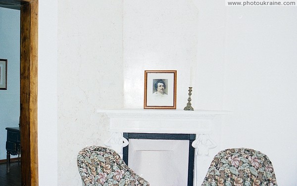 Verkhivnia. Portrait of French writer on mantelpiece Zhytomyr Region Ukraine photos