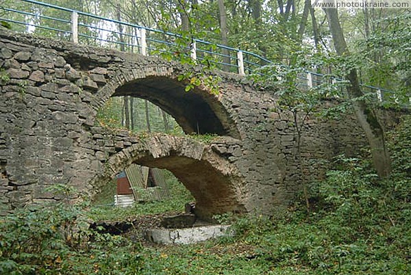 Verkhivnia. Arched bridge park manor Zhytomyr Region Ukraine photos