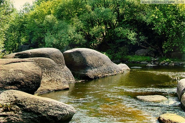 Korosten. Granite boulders in bed of river Uzh Zhytomyr Region Ukraine photos