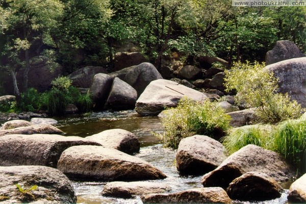 Korosten. Granite chaos in middle of channel Uzh Zhytomyr Region Ukraine photos