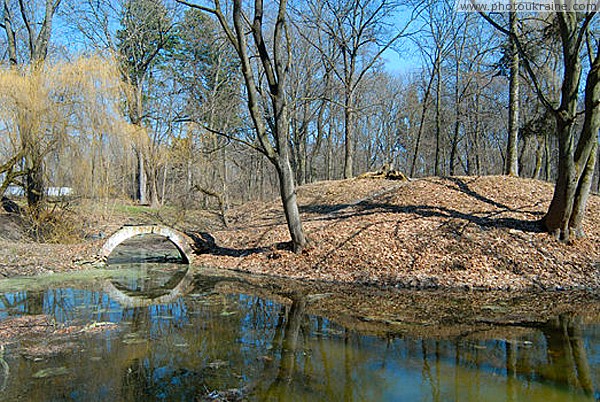 Nova Chortoryia. Bridge across pond Zhytomyr Region Ukraine photos