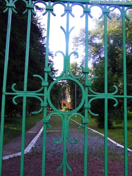 Turchynivka. Through bars of front gate of estate Zhytomyr Region Ukraine photos