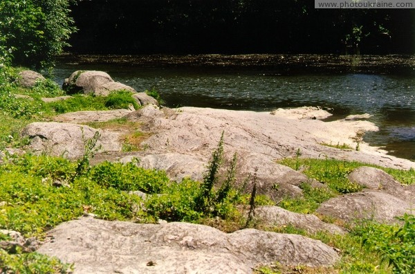 Chudniv. Stone bank river Teteriv Zhytomyr Region Ukraine photos