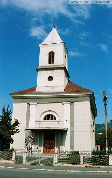 Velykyi Bychkiv. Front facade of Assumption Church Zakarpattia Region Ukraine photos