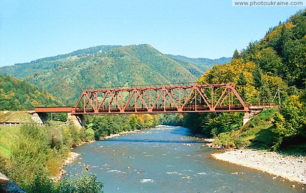 Dilove. Railway crossing river Tisa Zakarpattia Region Ukraine photos