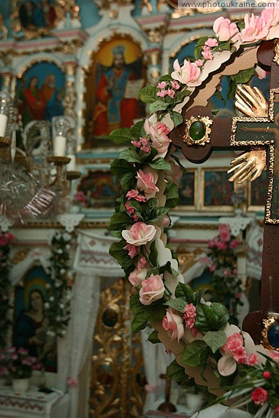 Deshkovtysia. Bright decor wooden church Zakarpattia Region Ukraine photos