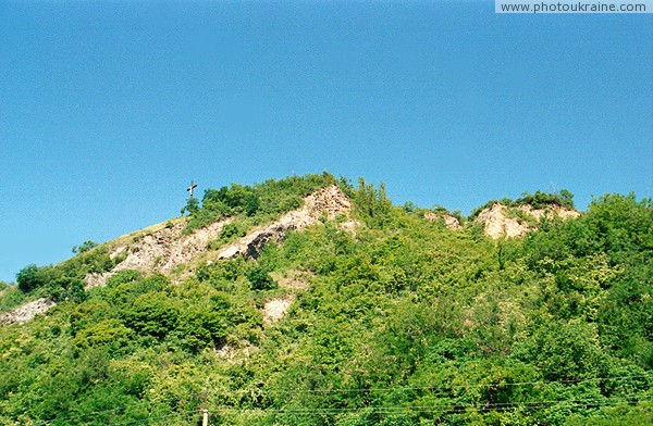 Mukacheve. Former quarry, topped with cross Zakarpattia Region Ukraine photos