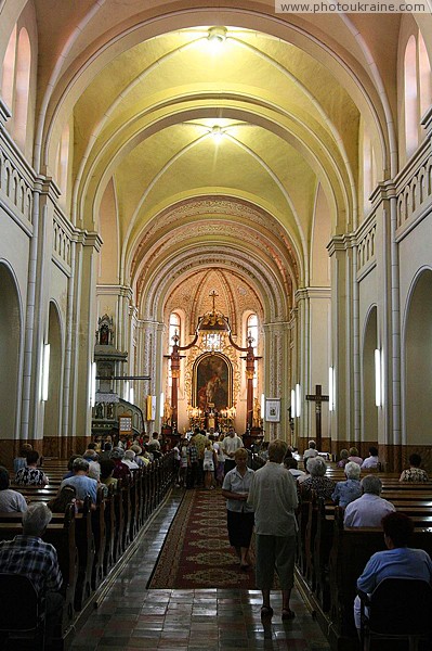 Mukacheve. Under arches of church Calvinists Zakarpattia Region Ukraine photos