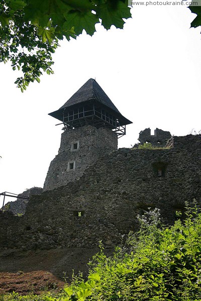 Nevytske. Tower of castle dungeon Nevytske Zakarpattia Region Ukraine photos