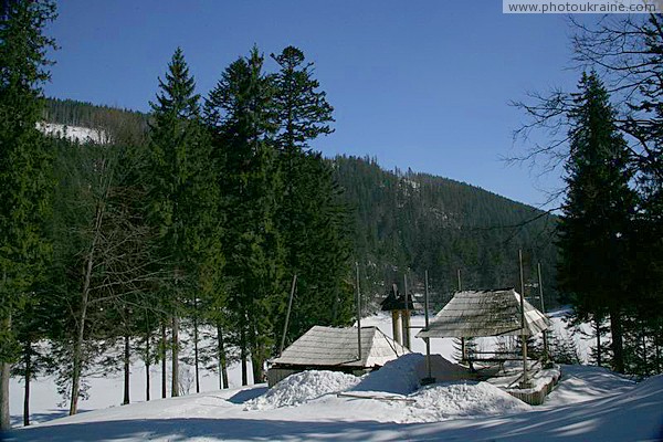 Reserve Synevyr. Tavern on shore of frozen lake Zakarpattia Region Ukraine photos